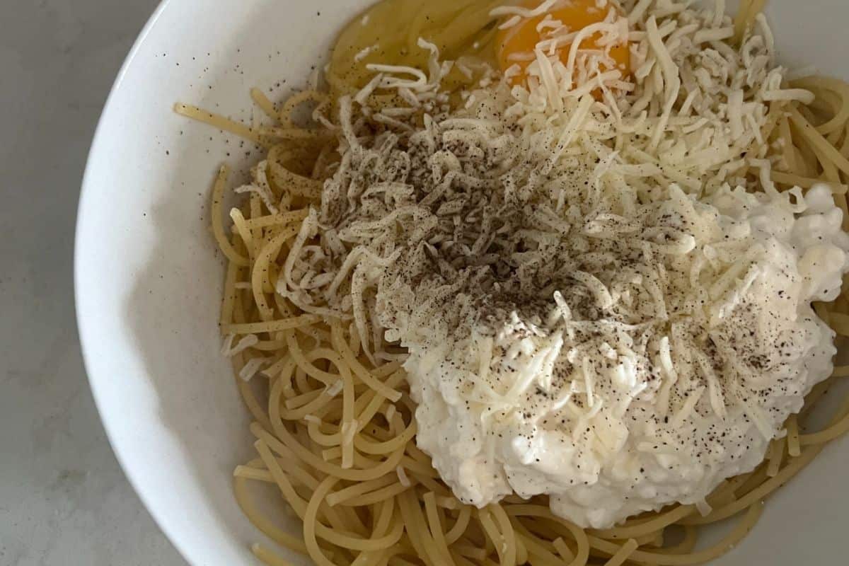 Spaghetti noodles mixed with cottage cheese, egg, and parmesan cheese. 