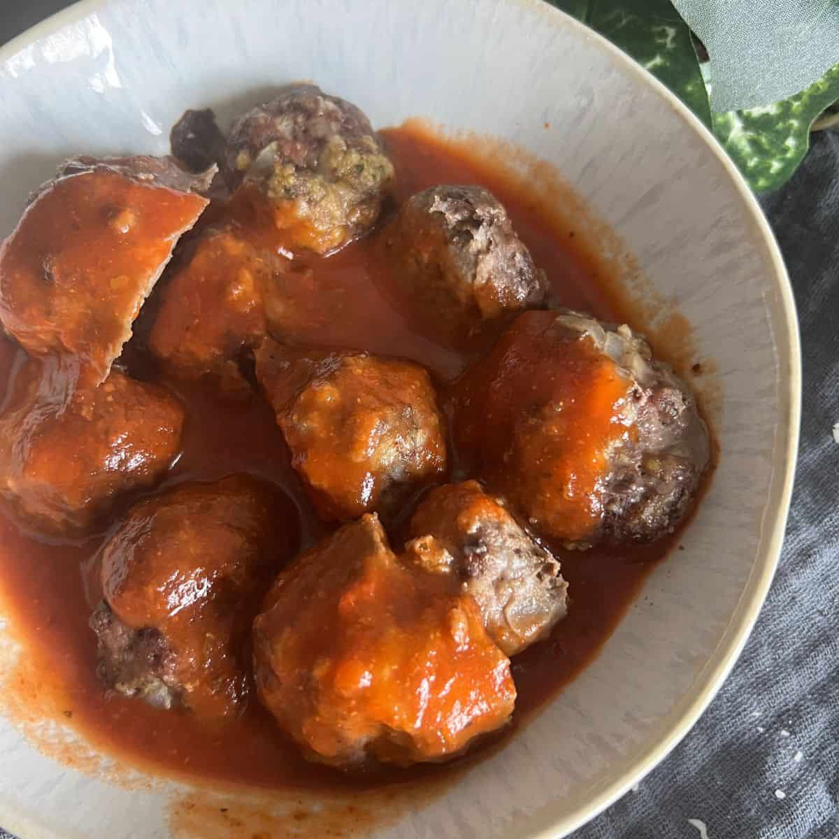 Weight Watcher Meatballs topped with marinara sauce in a bowl. 