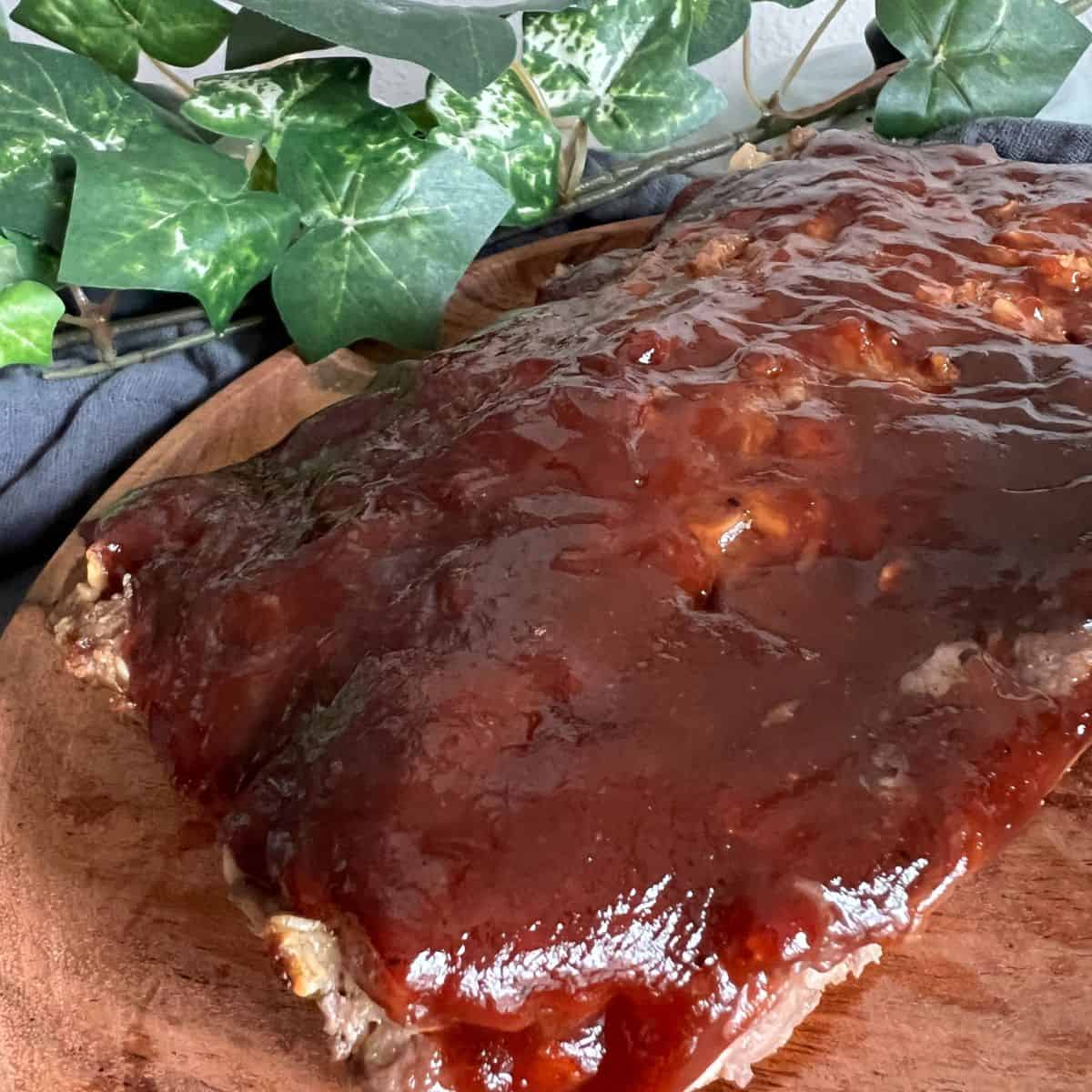 Biggest loser meatloaf on a wood cutting board. 