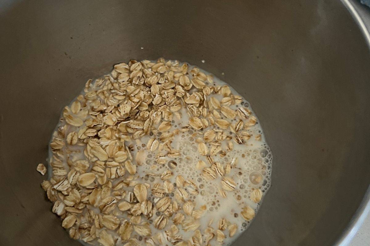 Oats and milk soaking in a bowl. 