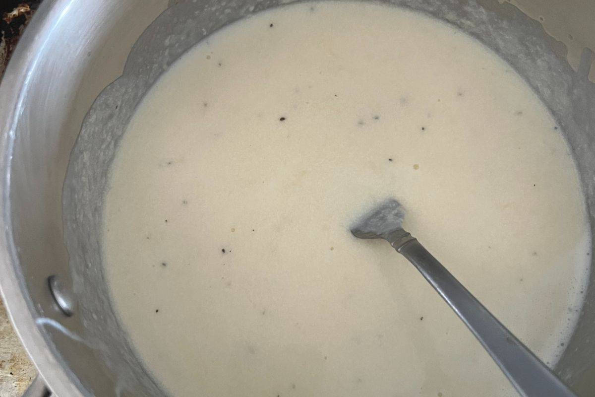 Cheese sauce thickened in a pan. 