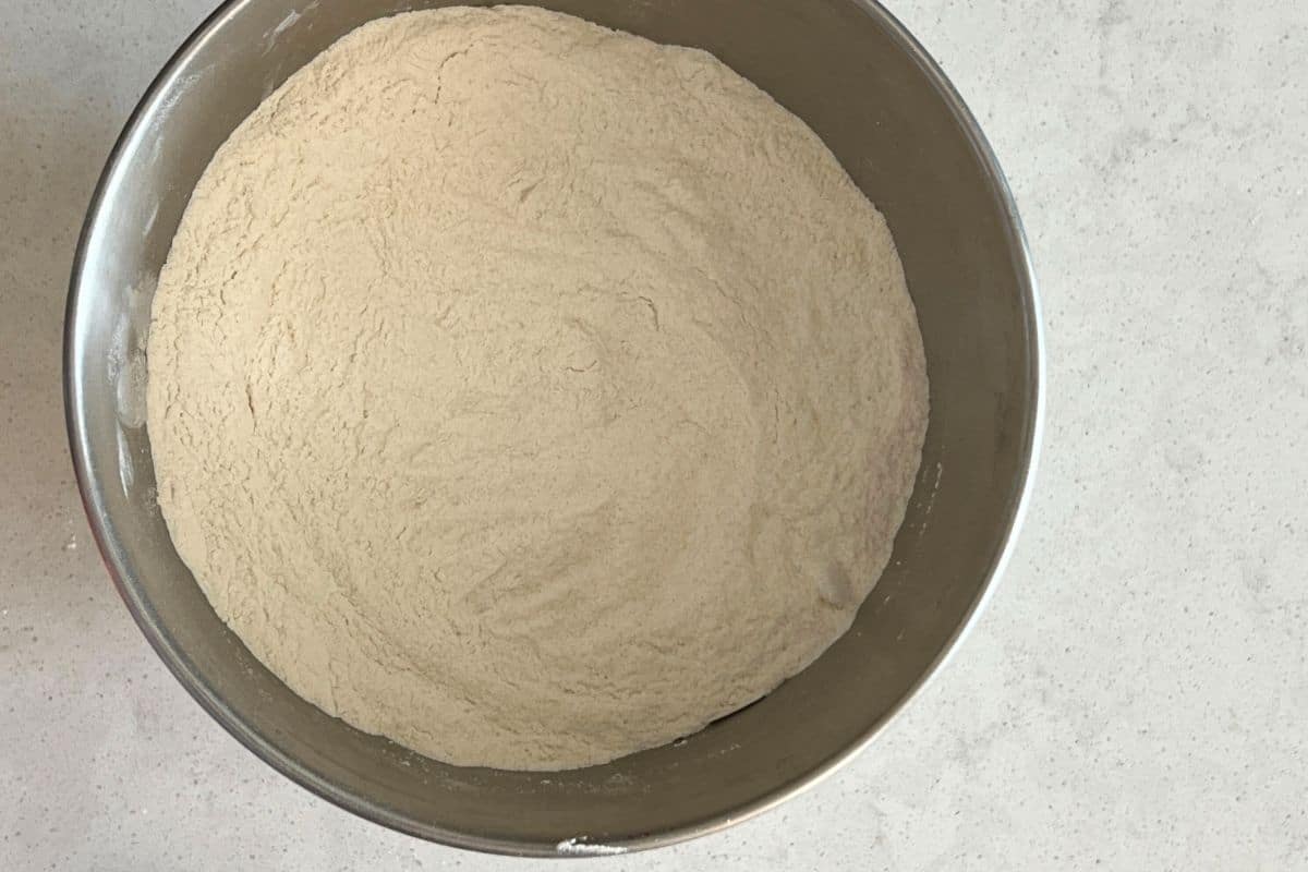 Dry ingredients for pancakes mixed together in a bowl. 