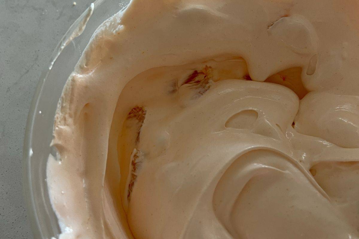 Mandarin oranges folded in with the Cool Whip mixture.
