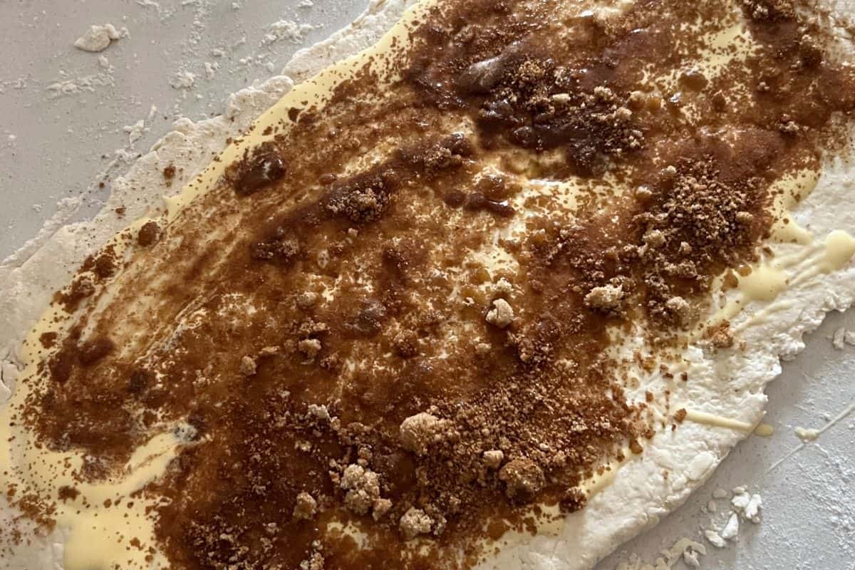 Brown sugar and cinnamon sprinkled on top of 2 ingredient dough. 