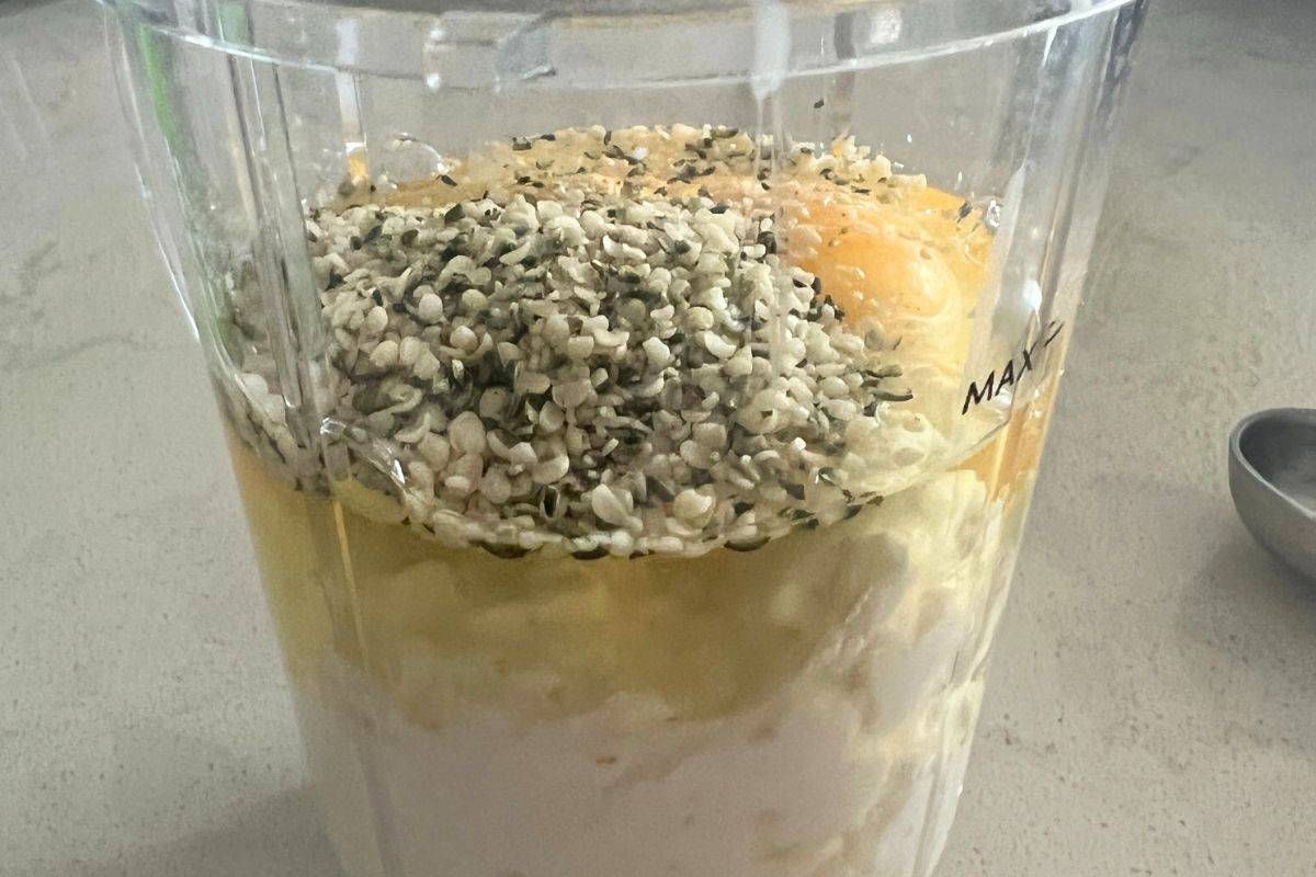Blended cottage cheese and and eggs in a blender. 