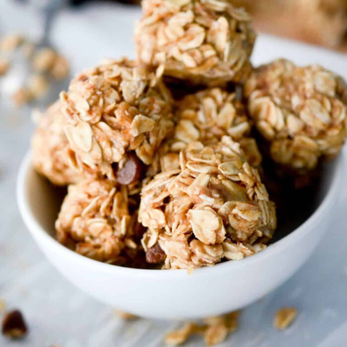 Banana oat energy bites in a white bowl.