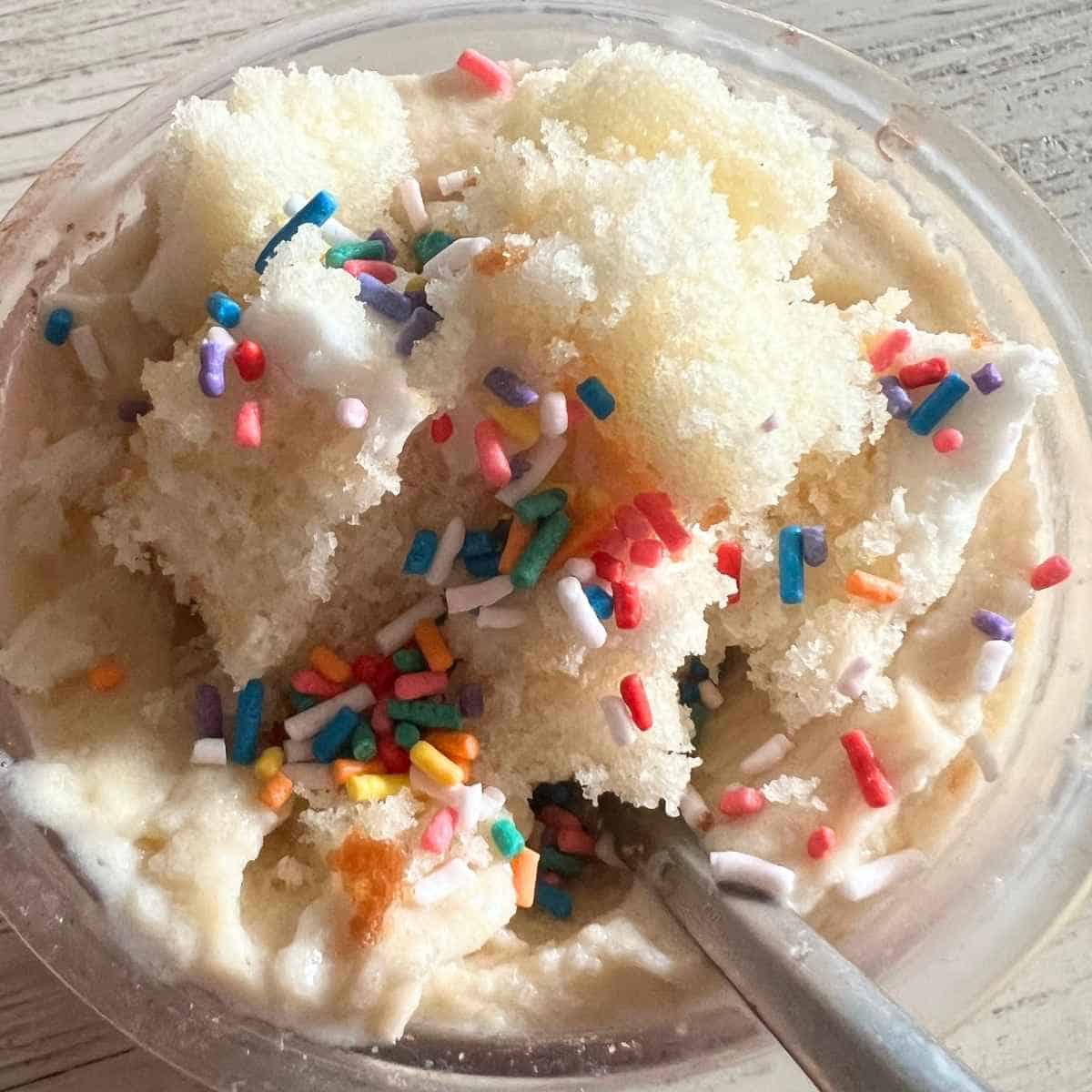 Ninja creami birthday cake ice cream topped with sprinkles.