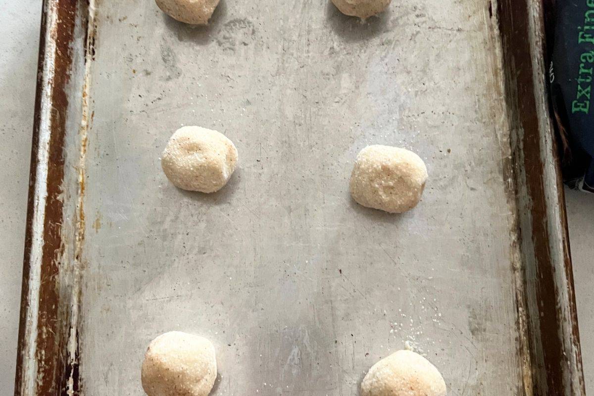 Snickerdoodle cookies on baking sheet.