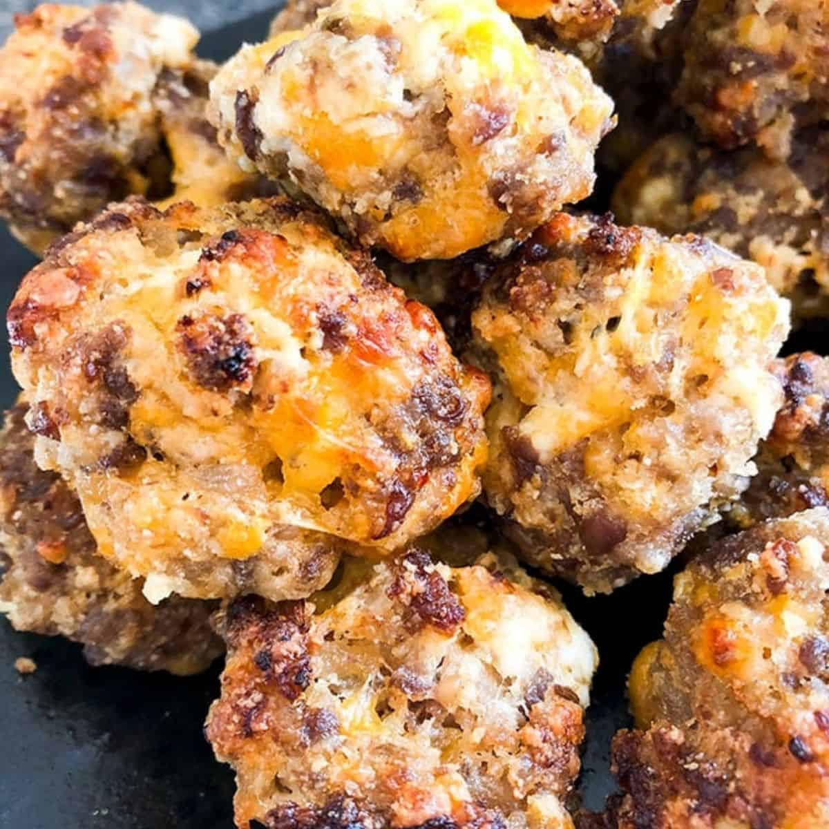 Air Fryer Keto Sausage Balls only contain four simple ingredients and make a great appetizer or snack.
