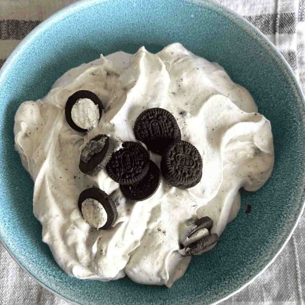 Oreo Fluff recipe topped with mini Oreos.