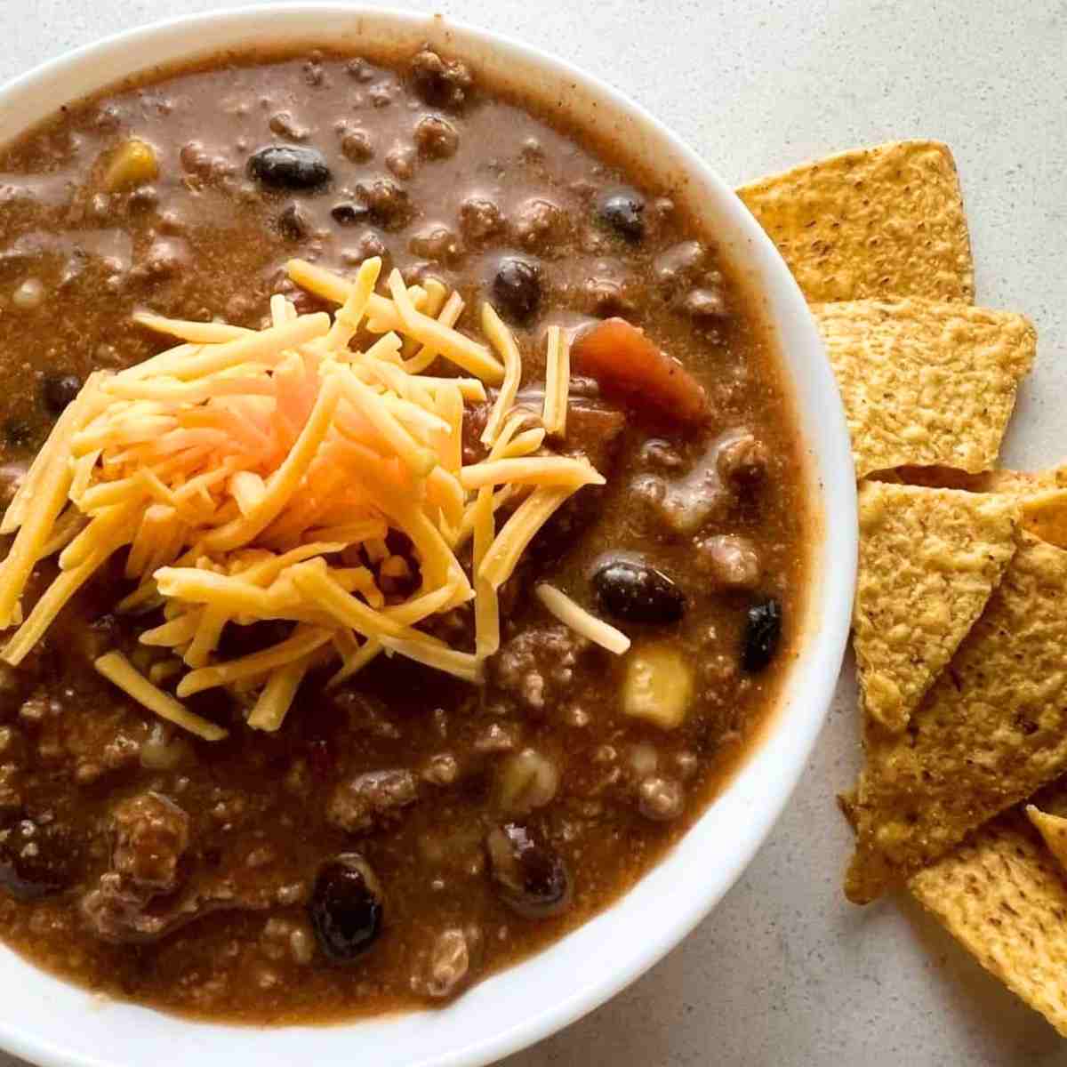 Paula Deen's taoc soup recipe topped with cheese.