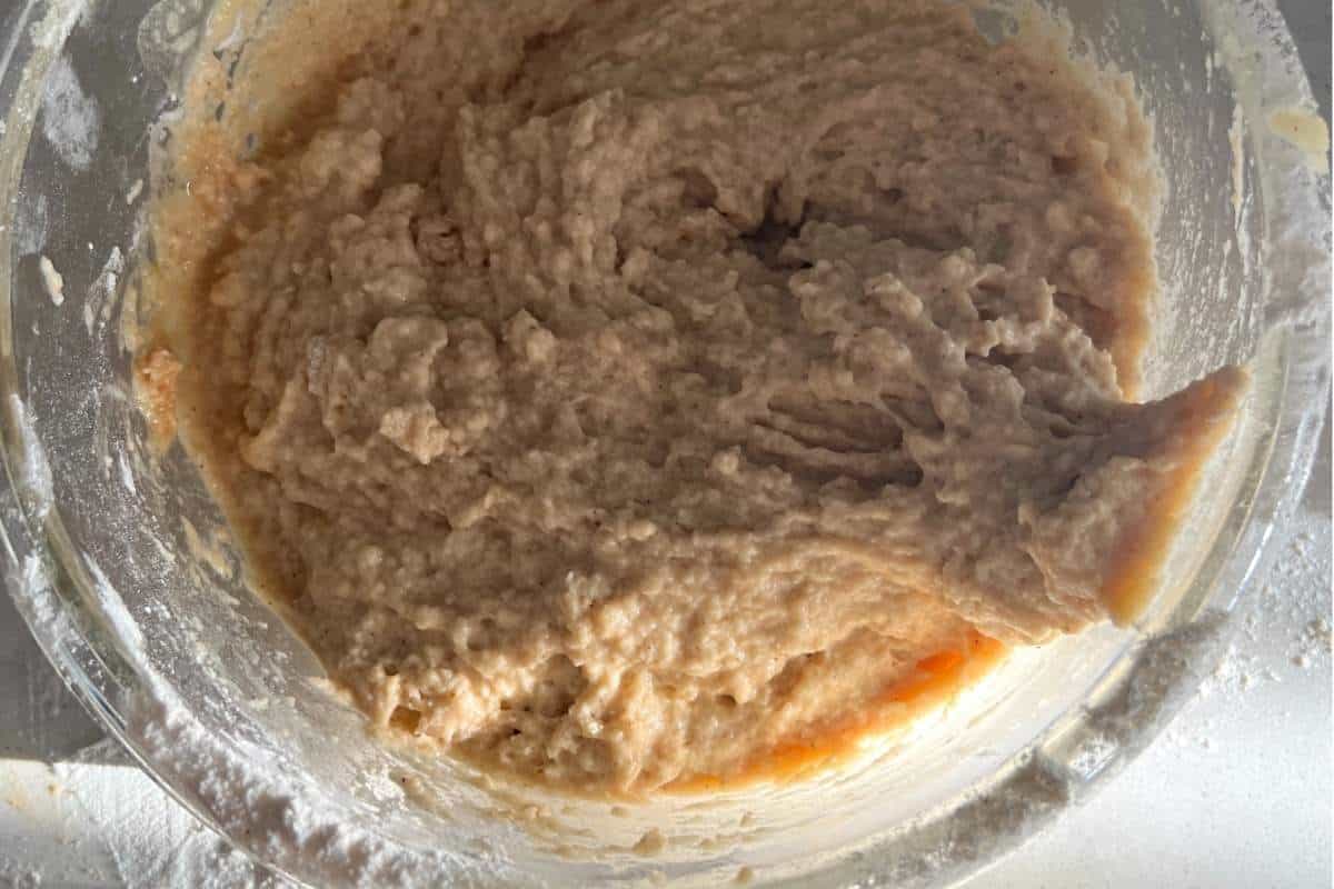 Donut mixture all combined together in a bowl.