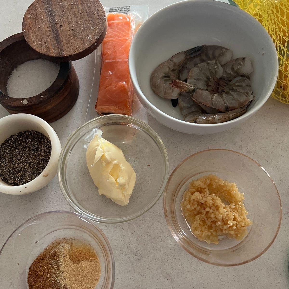 Ingredients needed for salmon foil packets.