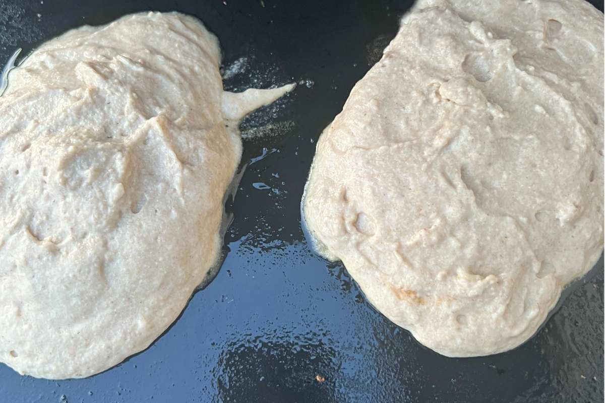 Batter on top of the pineapple pancakes.