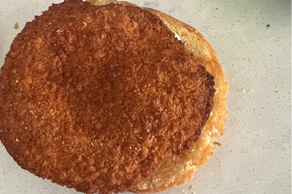 Assembling the chicken patty and making a sandwich.