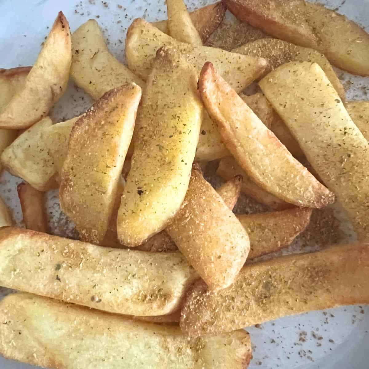 Seasoned crispy golden brown air fryer steaks. 