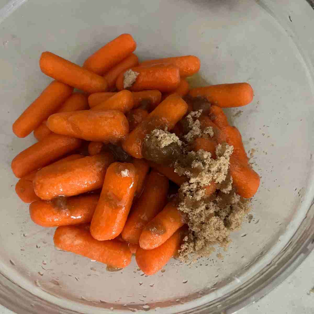 Glazed carrots mixed in a bowl.