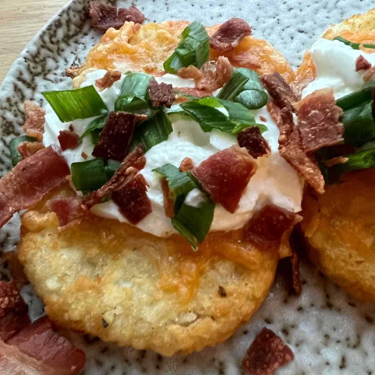 Loaded Hash Browns are my new favorite quick breakfast or go to appetizer to make in the air fryer.