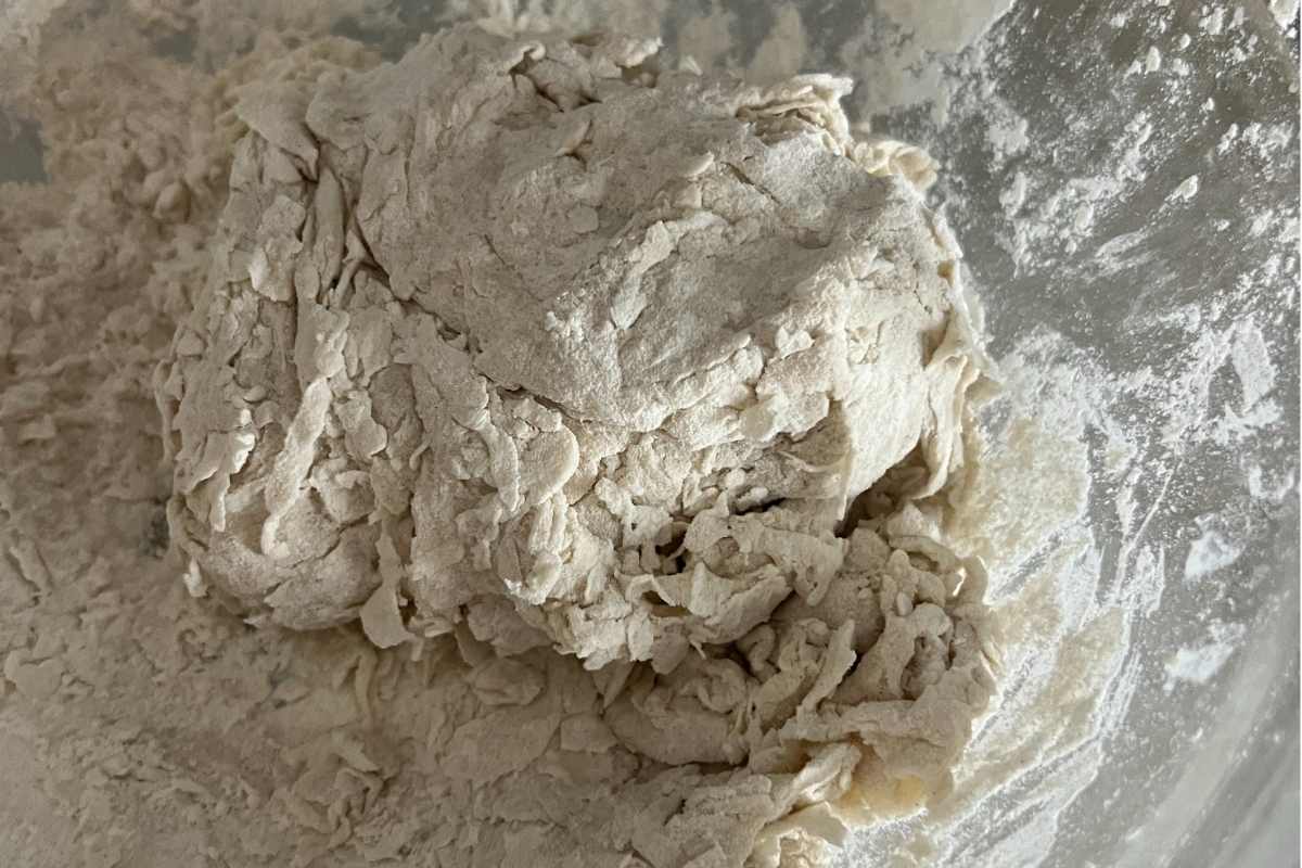 Combined flour and dough mixture in a ball ready for dumplings.