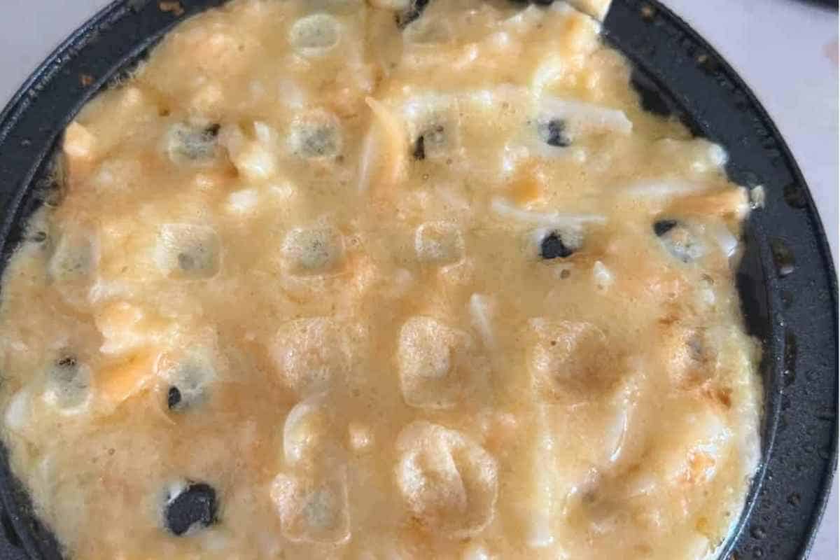 Waffle batter in a mini dash waffle maker. 