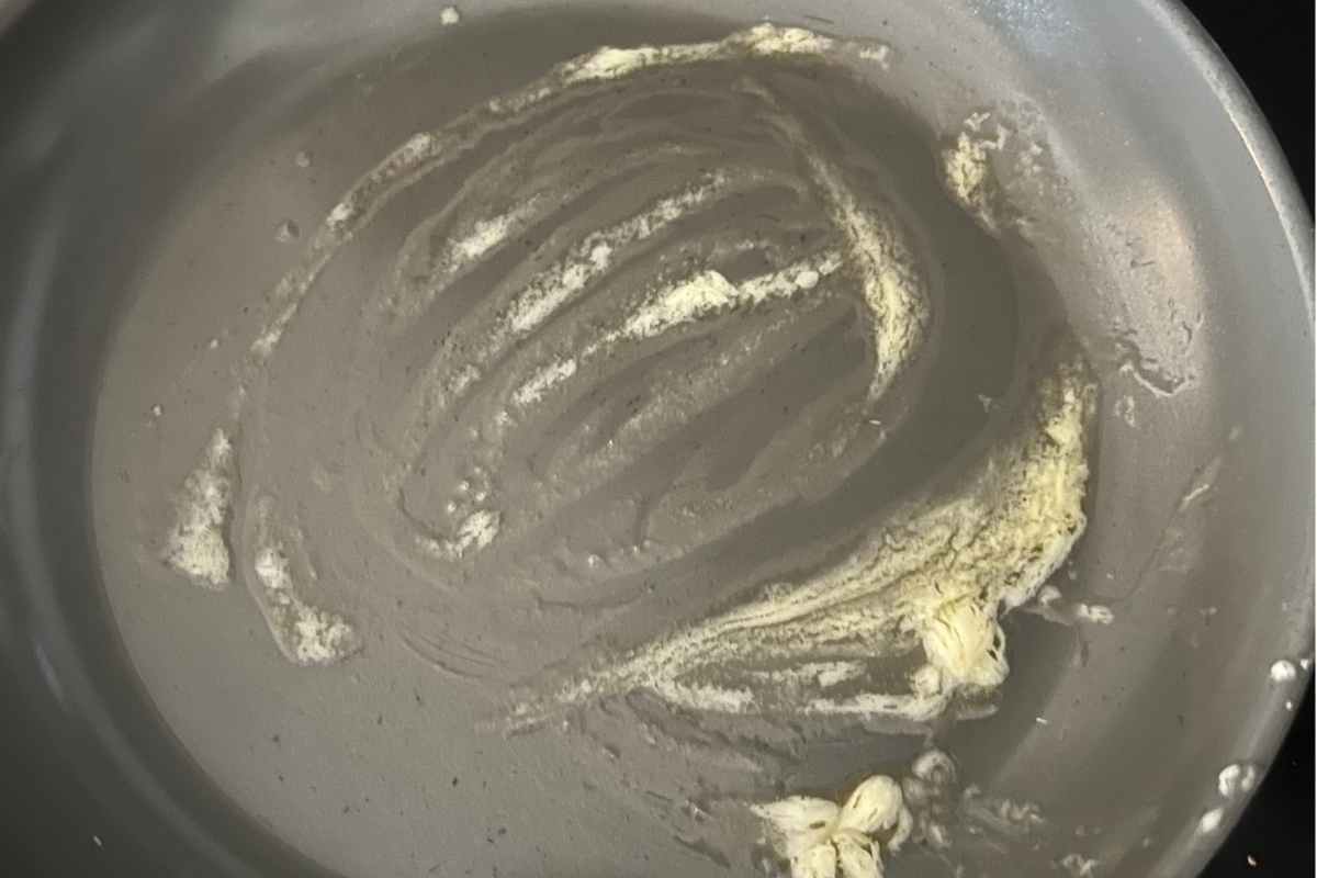 Melted butter in a skillet.