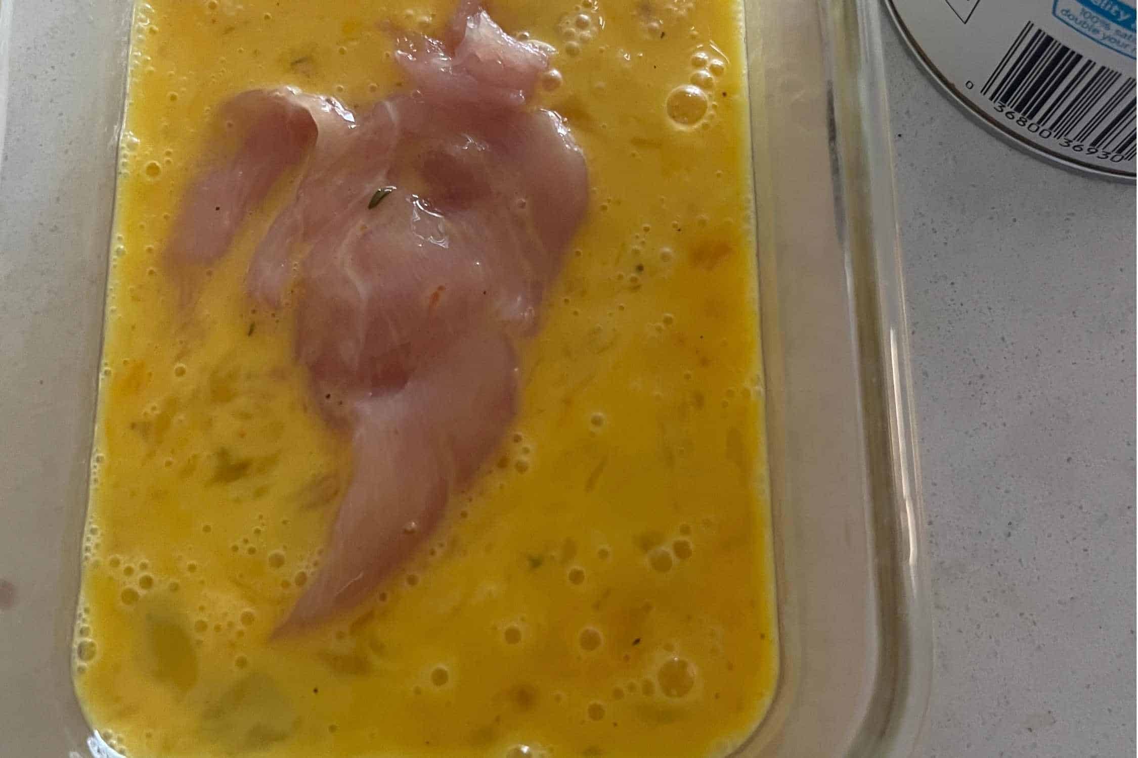 Chicken dipped in egg wash. 