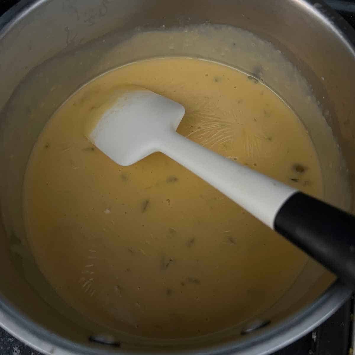 Melted nacho cheese sauce for Taco John's. 