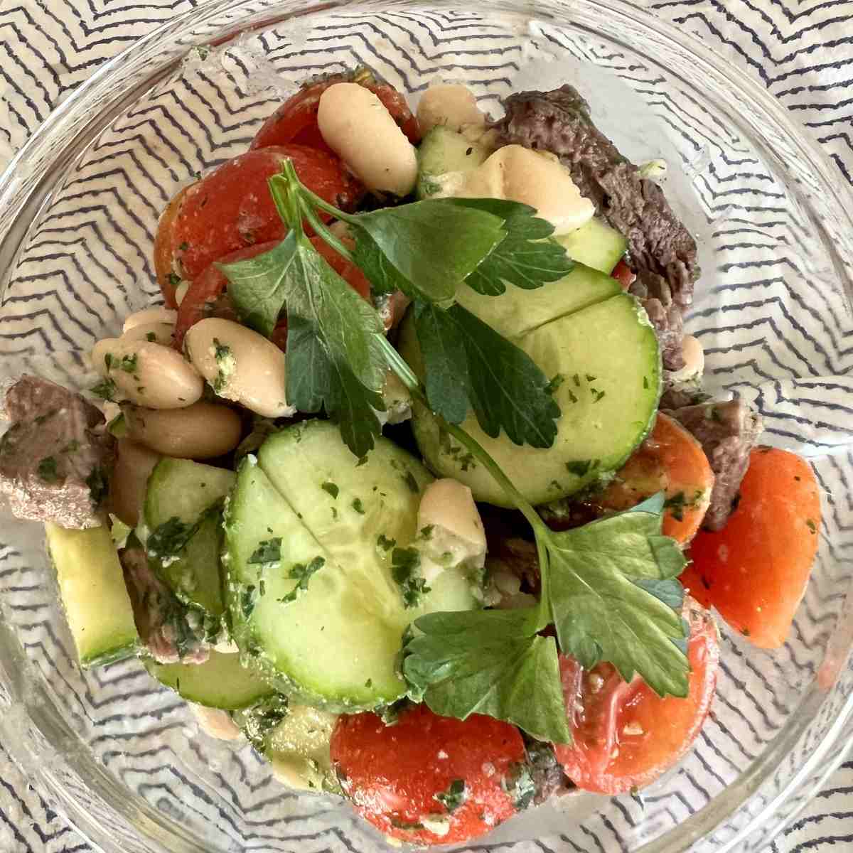 Viral Steak Chimichurri salad with dense bean salad.