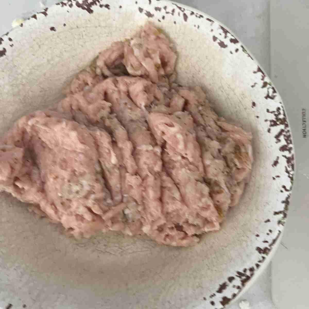 Ground chicken in a bowl. 