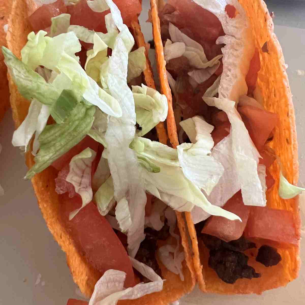 Finished ground beef tacos ready to eat.