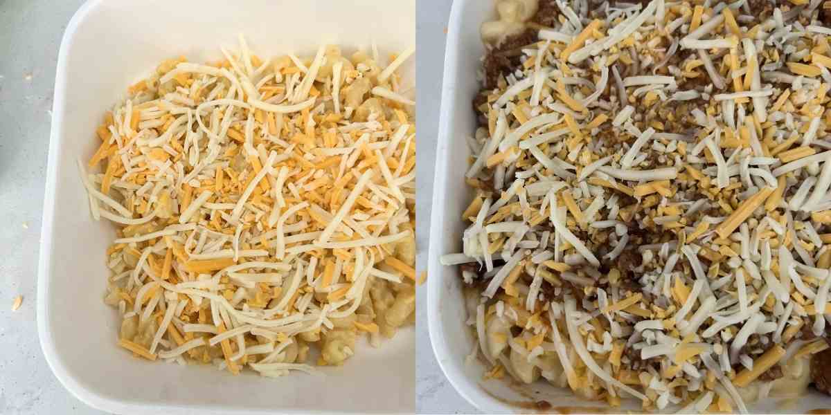 Layered mac and cheese with meat sauce in a casserole dish.