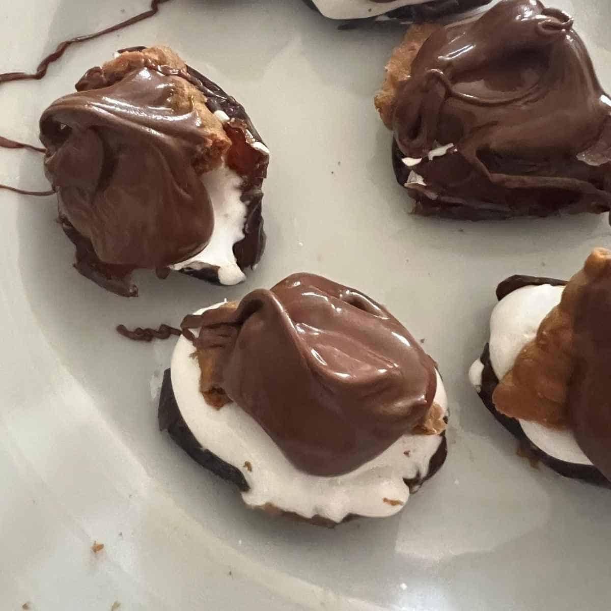 Smore dates with chocolate, cookies, and marshmallow fluff.