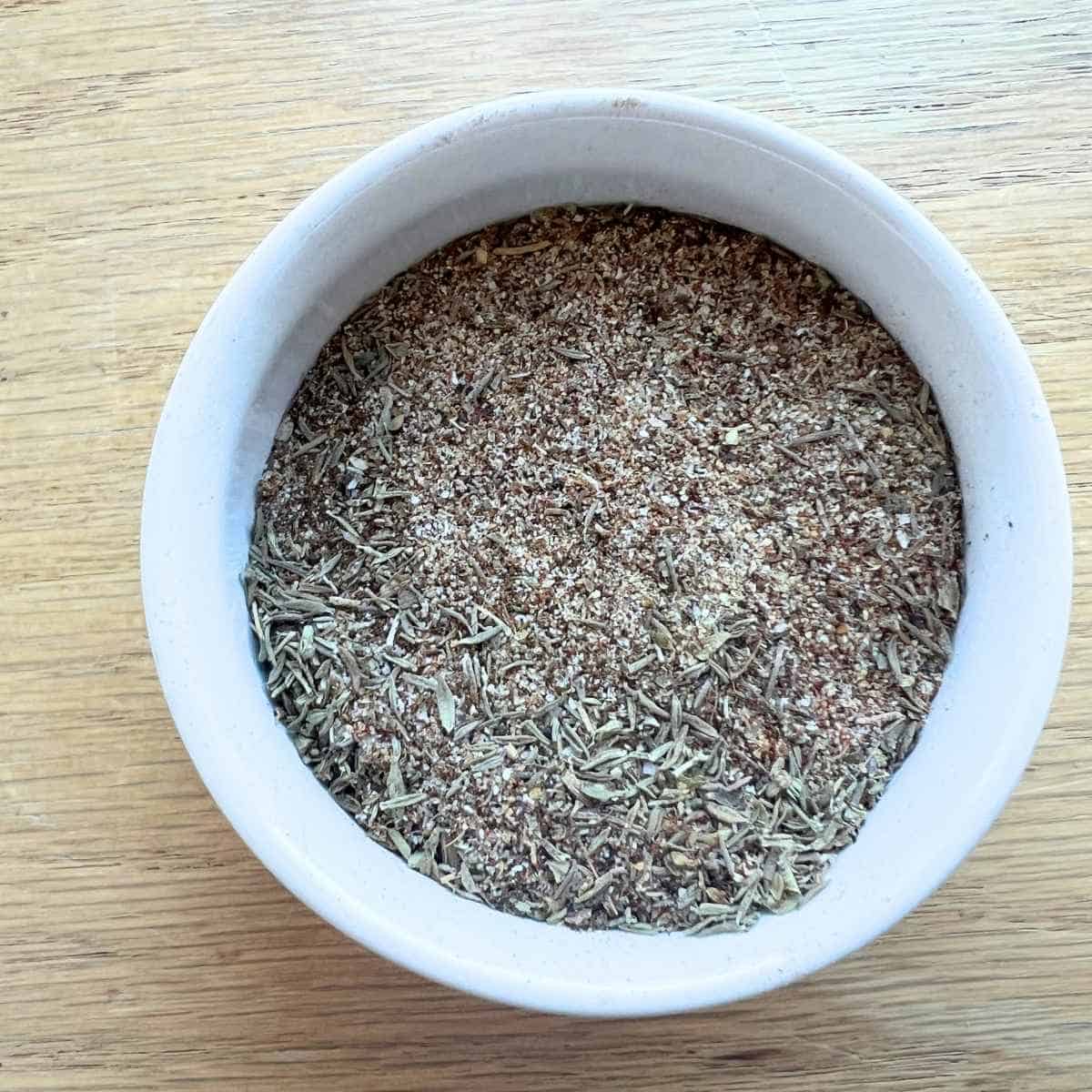 Blackened seasoning recipe for fish in a white bowl.