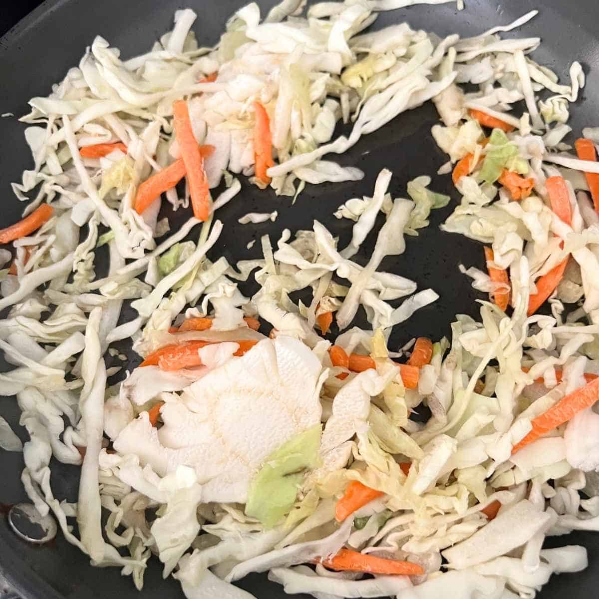 Cabbage egg roll in a bowl.