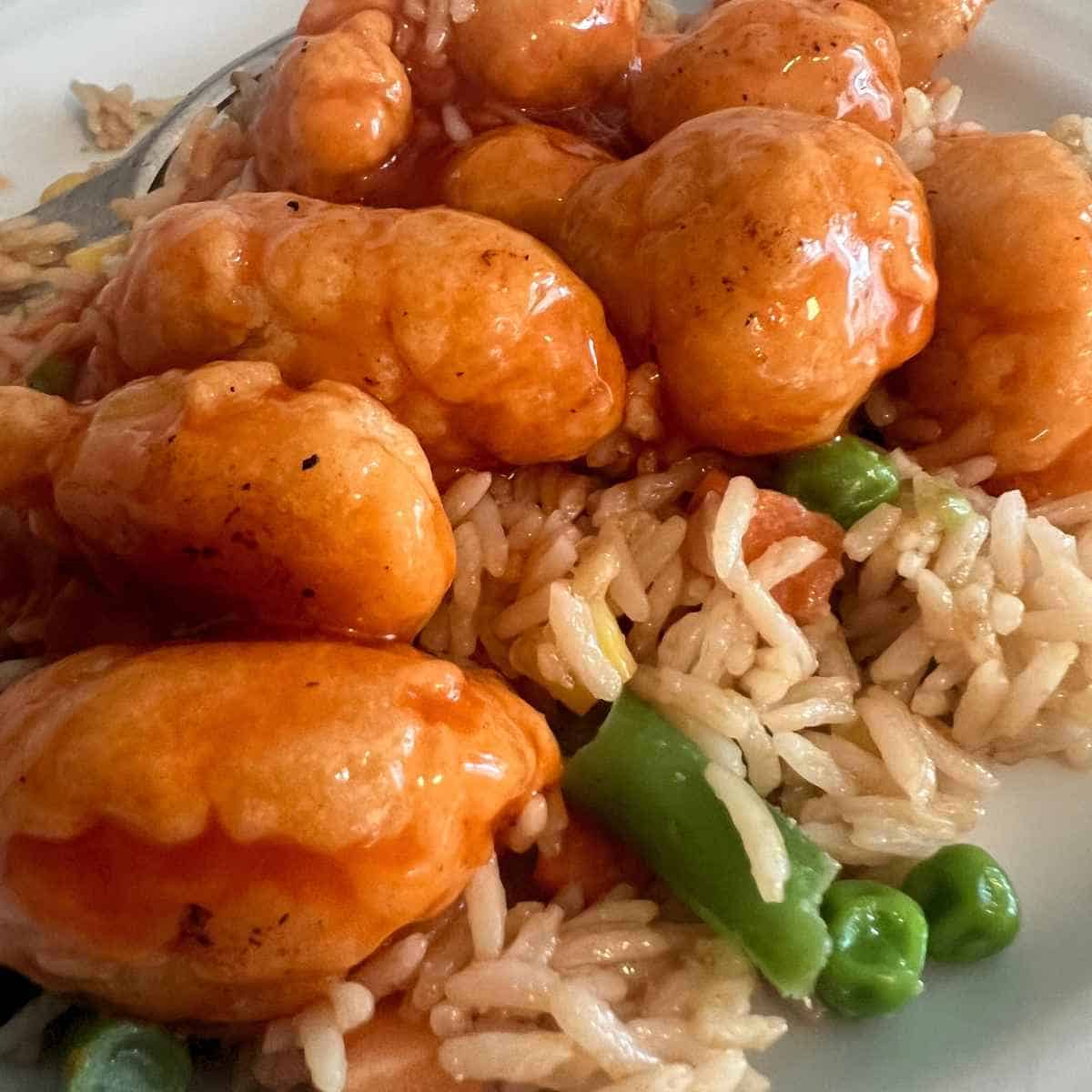 Air fryer sweet and sour chicken with fried rice.