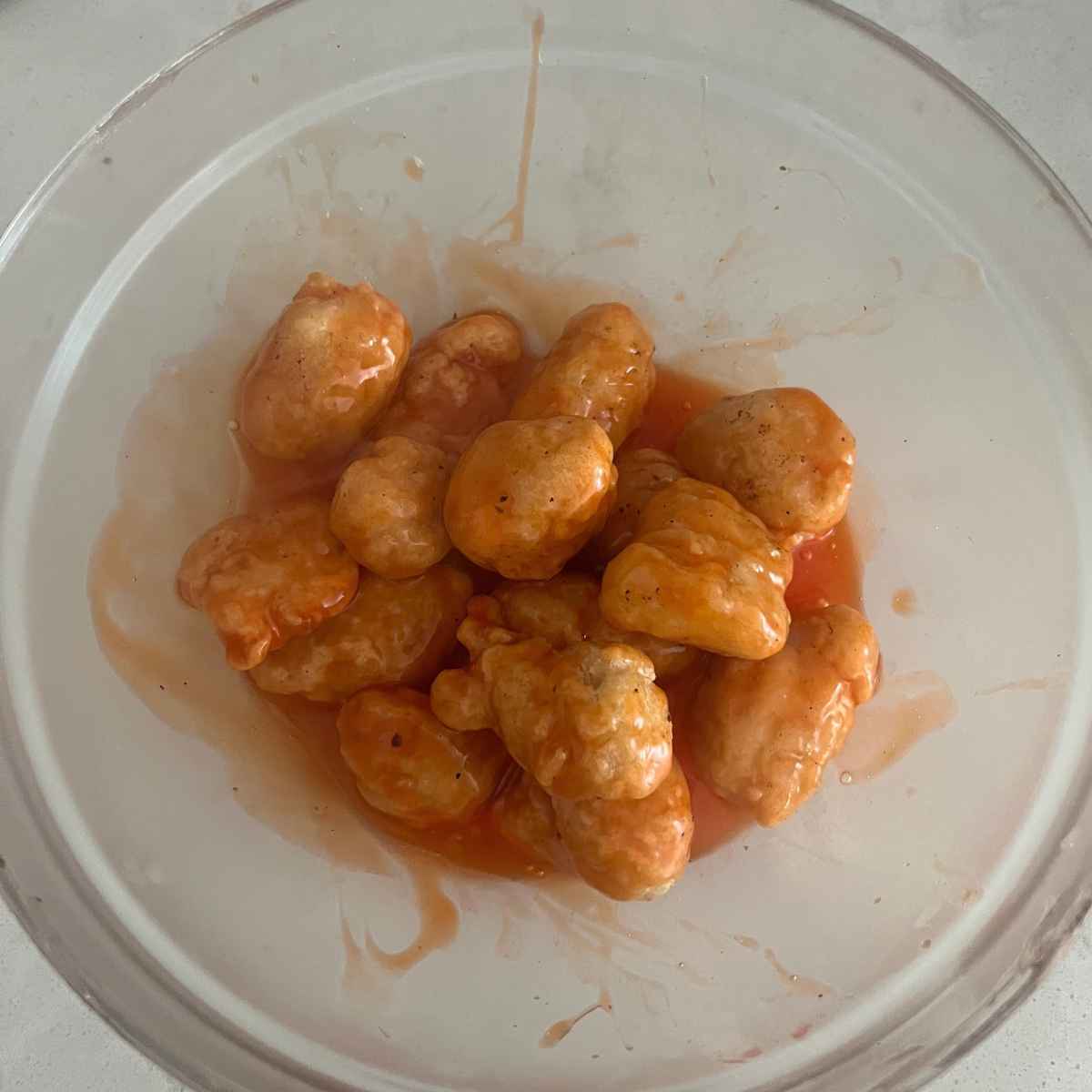 Sauce or cooked chicken.